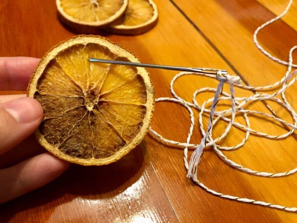 Decorative string and needle. Dried Orange Garland DIY. DIY crafts for Christmas. Holiday crafts. Homemade garland.  Holiday decor. Christmas decor.