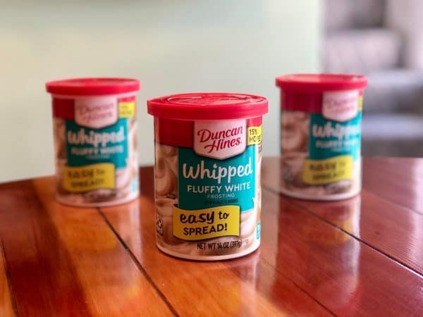 Trash to treasure repurposing empty frosting containers. How to reuse empty containers. Frosting Containers. Frosting Container DIY.