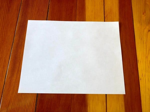 Step one of How to make a zine DIY. How to make a zine tutorial. Zine DIY. Zine ideas. Make your own zine. No staples zine. One piece of paper crafts. One piece of paper zine.