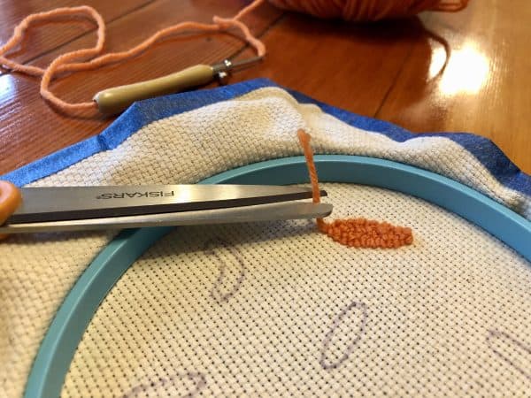 How to make a candle mat DIY. Monks cloth. Embroidery hoop. Painter's tape. Punch Needle project for beginners. Punch Needle ideas. Acrylic Yarn. Punch Needle.