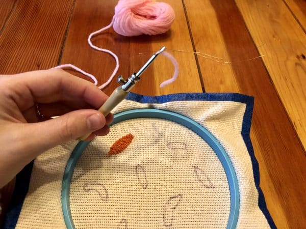 How to make a candle mat DIY. Monks cloth. Embroidery hoop. Painter's tape. Punch Needle project for beginners. Punch Needle ideas. Acrylic Yarn. Punch Needle.
