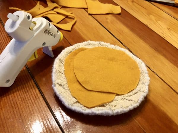 How to make a candle mat DIY. Monks cloth. Hot glue gun. Fleece. Fleece backing. Punch Needle project for beginners. Punch Needle ideas. Acrylic Yarn. Punch Needle.